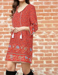 Red V Neck Bohemian styled dress with Floral print, v neck, above the knee, and tassels
