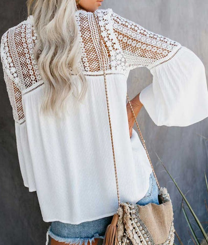 This flowy women's blouse has stunning floral embroidered and hollowed out Bohemian patterns with a nice v-neck, flared half sleeves, button decorations, and is a comfortable Cotton pullover shirt. Whether a lunch date, or for the office; you can show your Bohemian style wherever you go. White