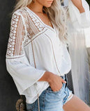 This flowy women's blouse has stunning floral embroidered and hollowed out Bohemian patterns with a nice v-neck, flared half sleeves, button decorations, and is a comfortable Cotton pullover shirt. Whether a lunch date, or for the office; you can show your Bohemian style wherever you go. White